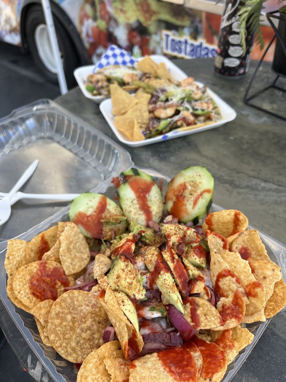 Printed menu for tacos and seafood specials.