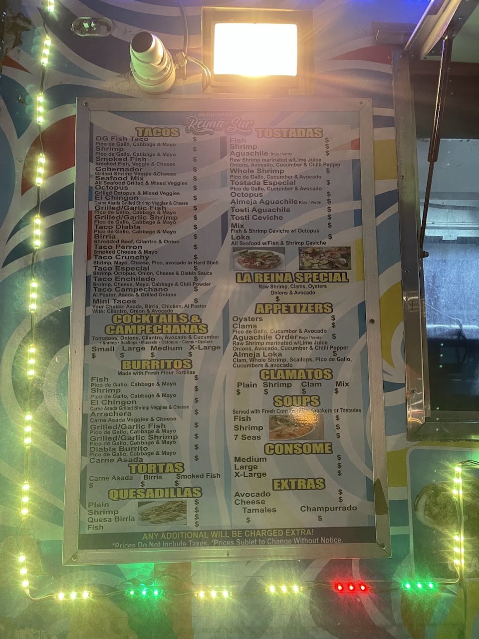 Restaurant menu with seafood and Mexican dishes.